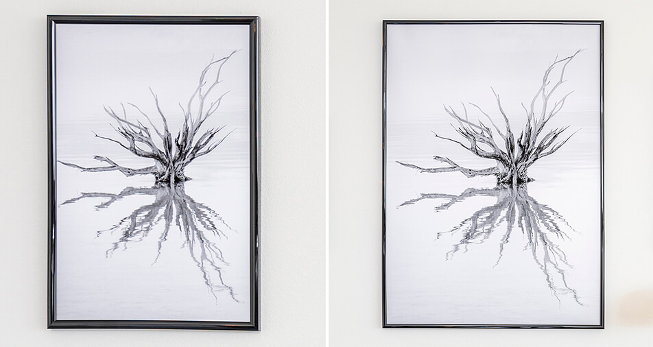 Dva lesklé černé rámy s černobílým motivem